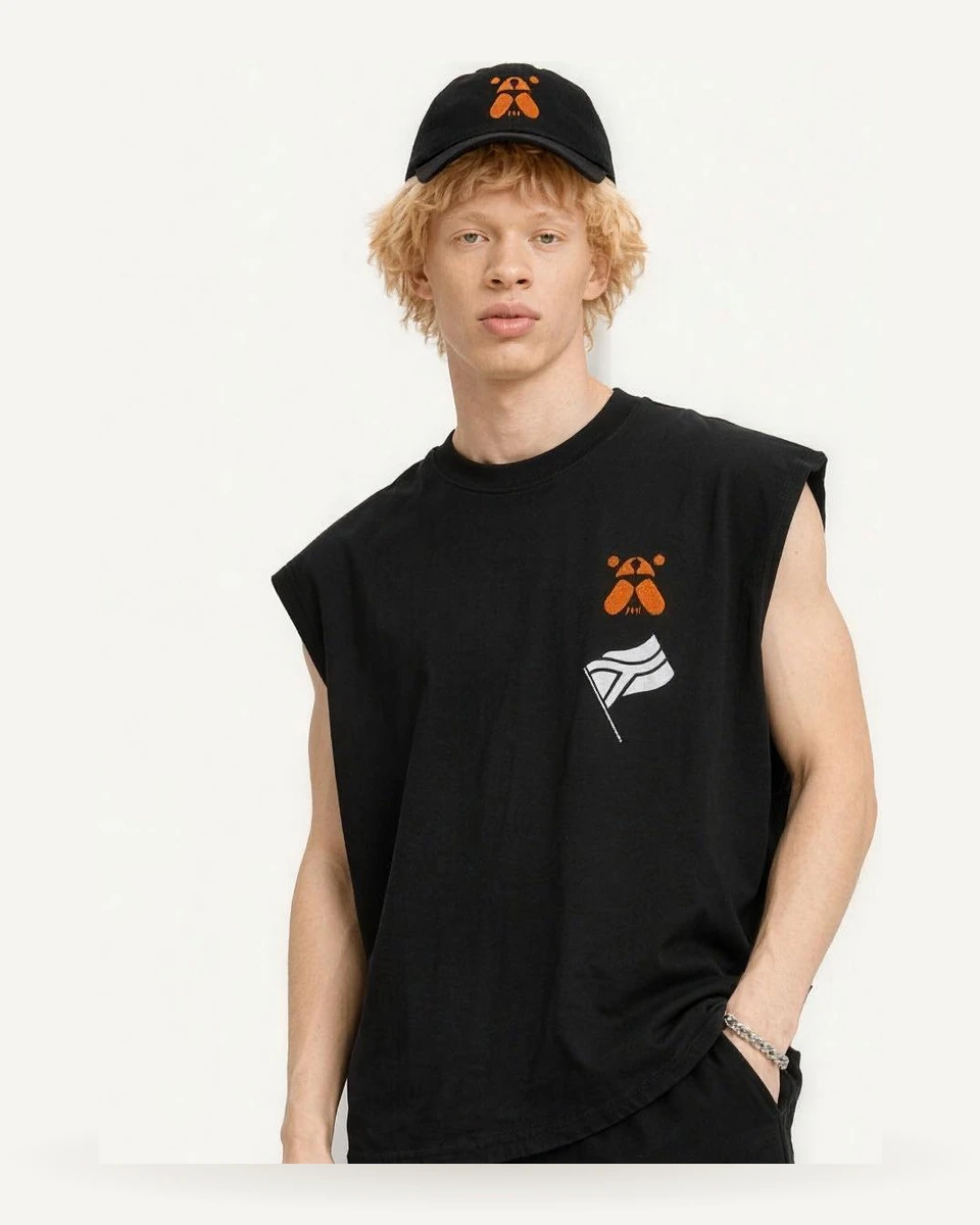 SACXESS Tank Top worn with the SACXESS shorts and cap.